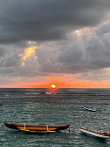 Outrigger Canoes at Kaimana Beach Sunset